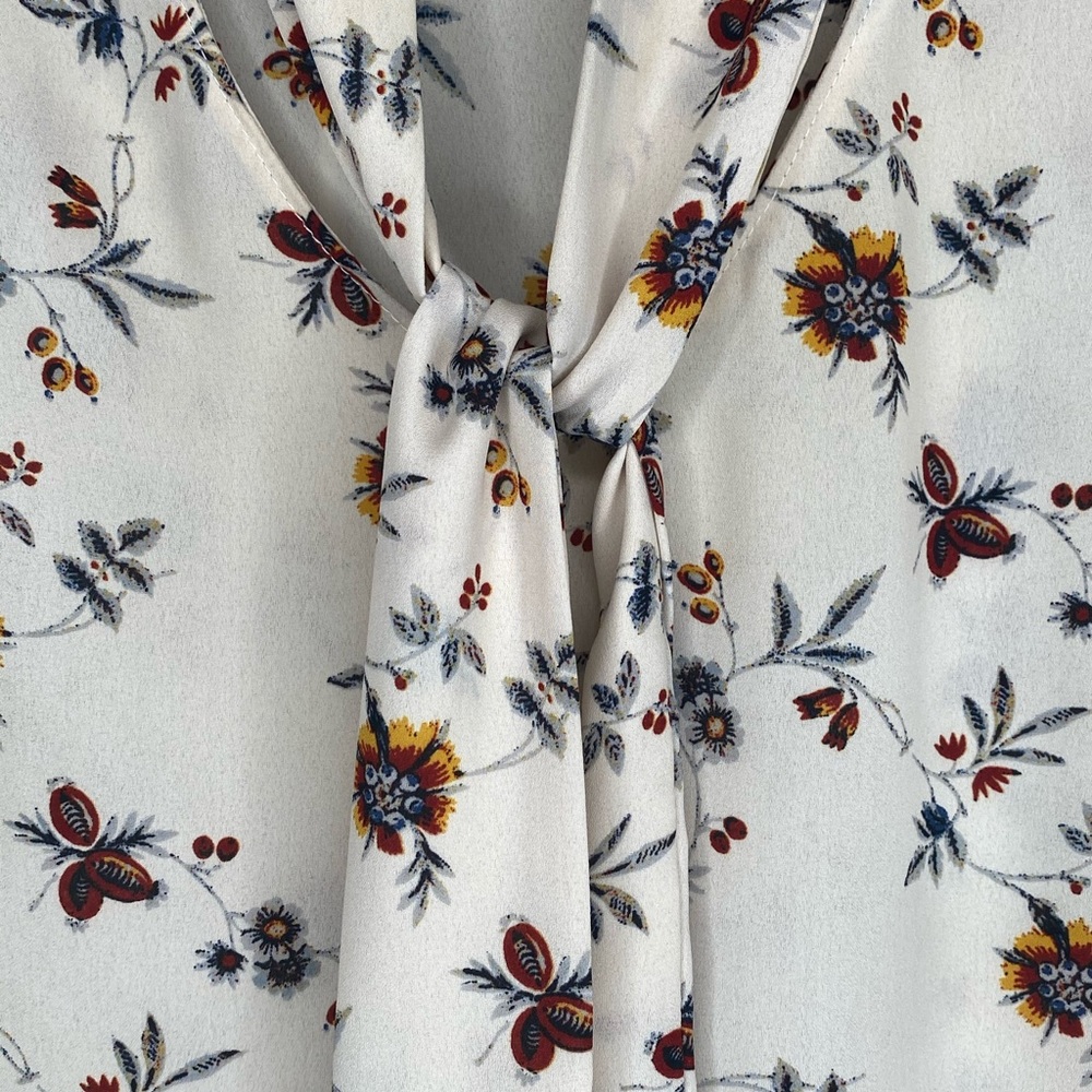 Ivory ground rustic floral tie neck blouse